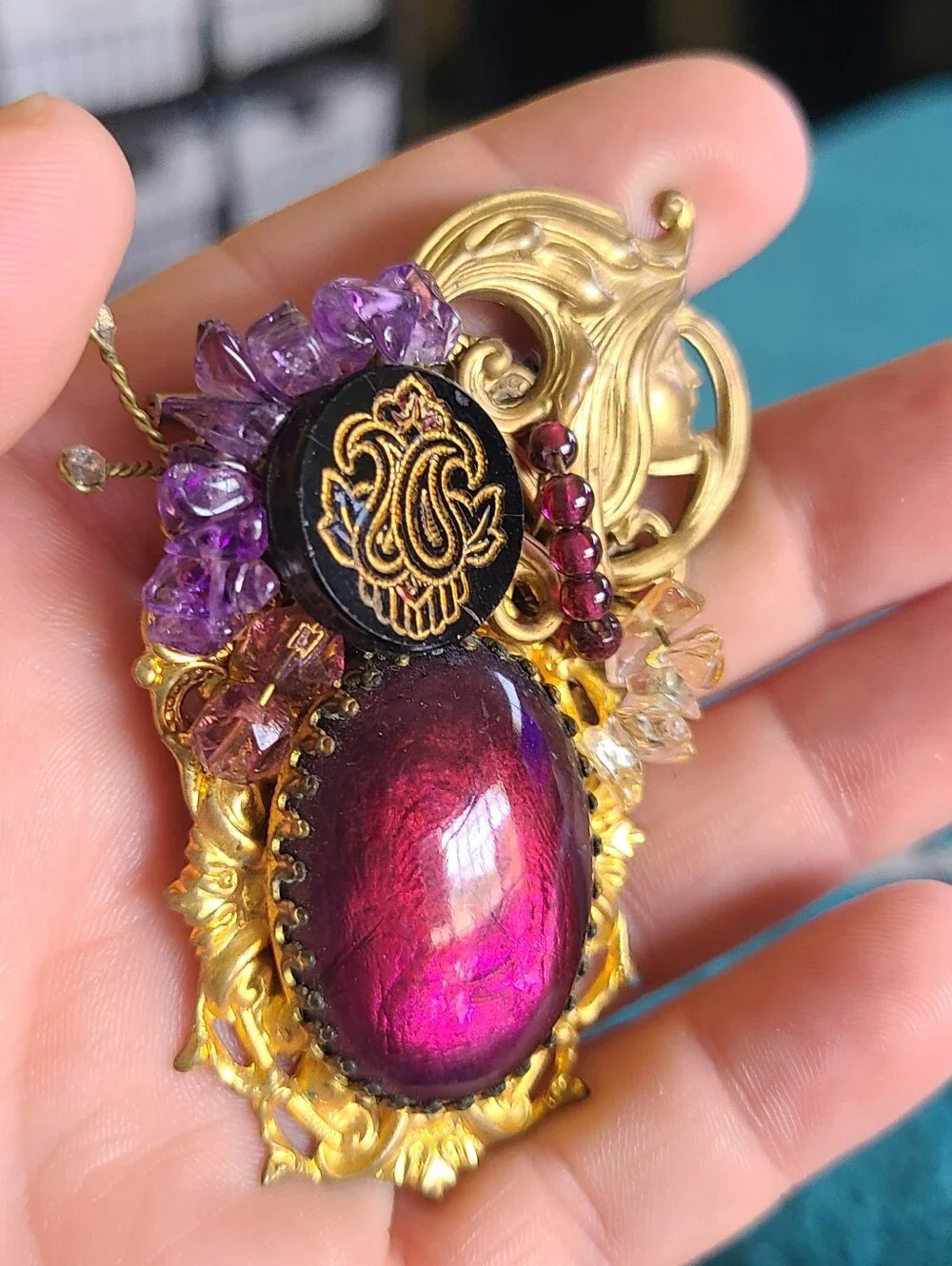 Hand Crafted Gold-Tone Brooch with Deep Purple Cabochon and Amethyst Chips